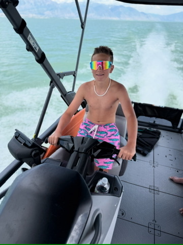 Kid at the helm on Utah Lake